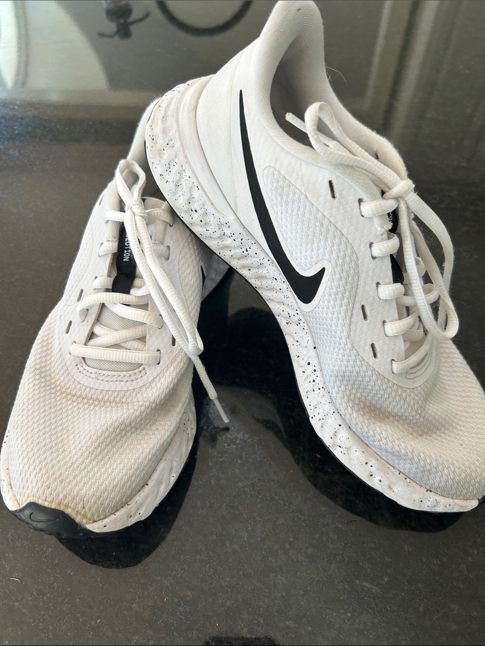 Nike White Women's Athletic Running Shoes with Black Swoosh